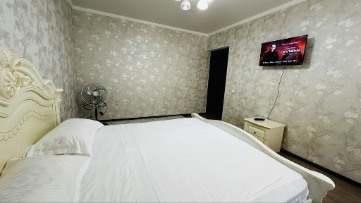 Уютная квартира напротив Алматы Арены