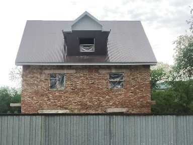 Продам коттедж в черновом варианте в центре городе Алга.