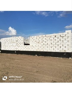 Недостроенный дом в поселке Караоткель (Ильинка)