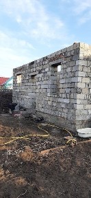 Продам недостроеный дом в городе