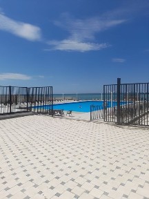 Квартира у берега моря