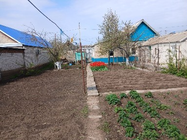 Продам дом саманный обложенный кирпичем