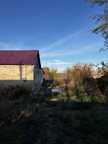 Продам дом с гаражом в бедняцком